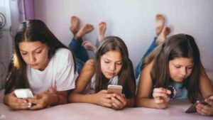 Proactive Parenting Blog Post Three Girls on their phones